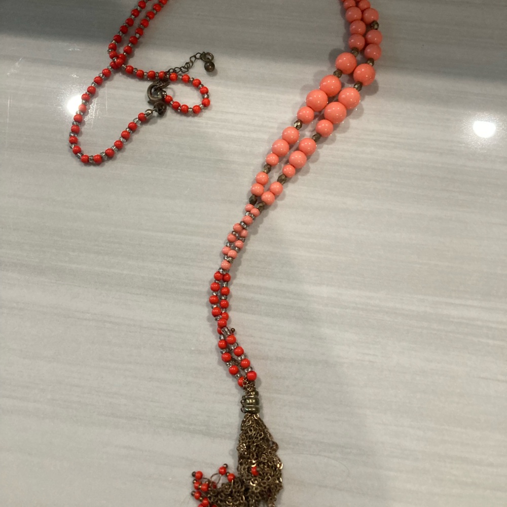 casual coral colored beaded necklace